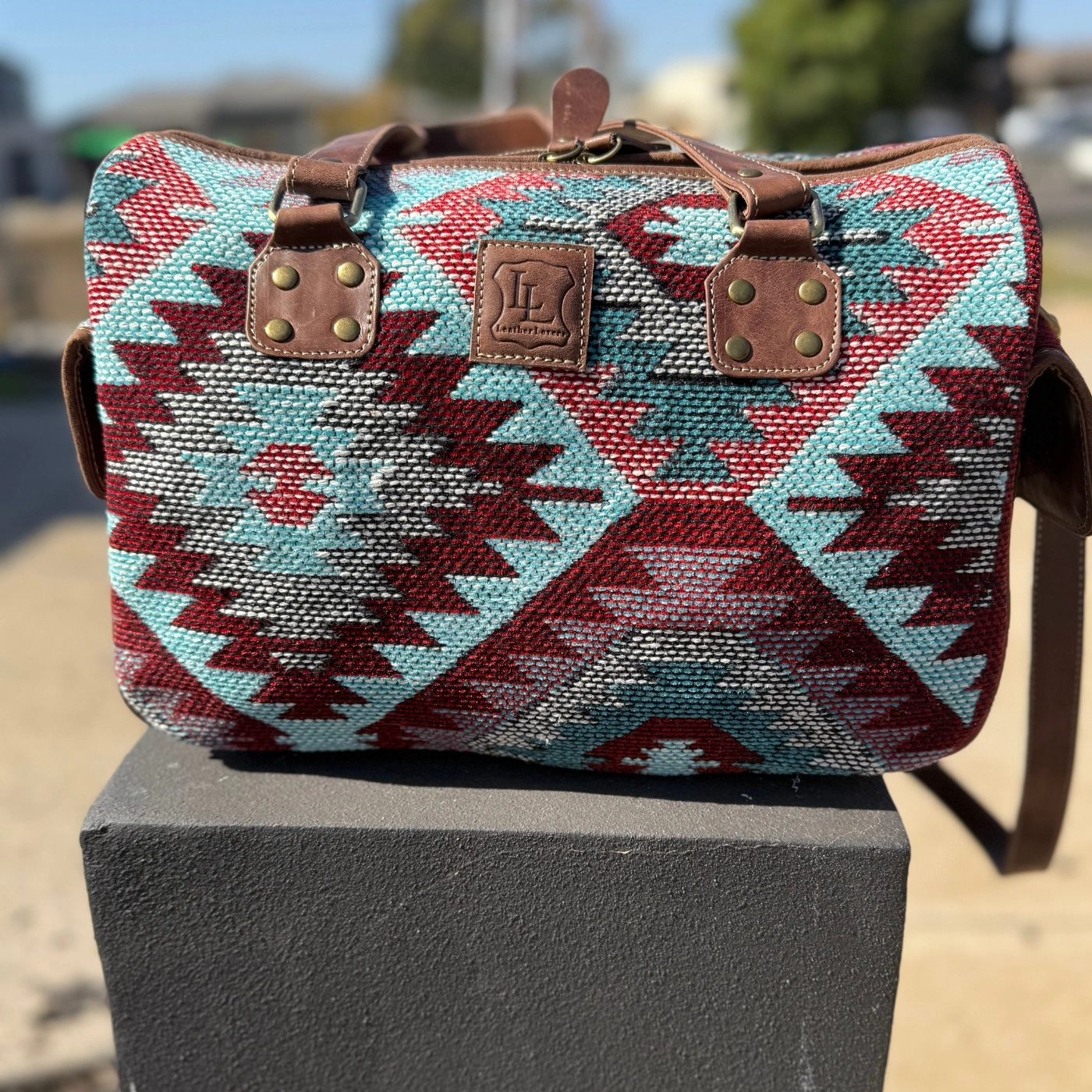 mini rustic duffel bag made from woven tribal fabric